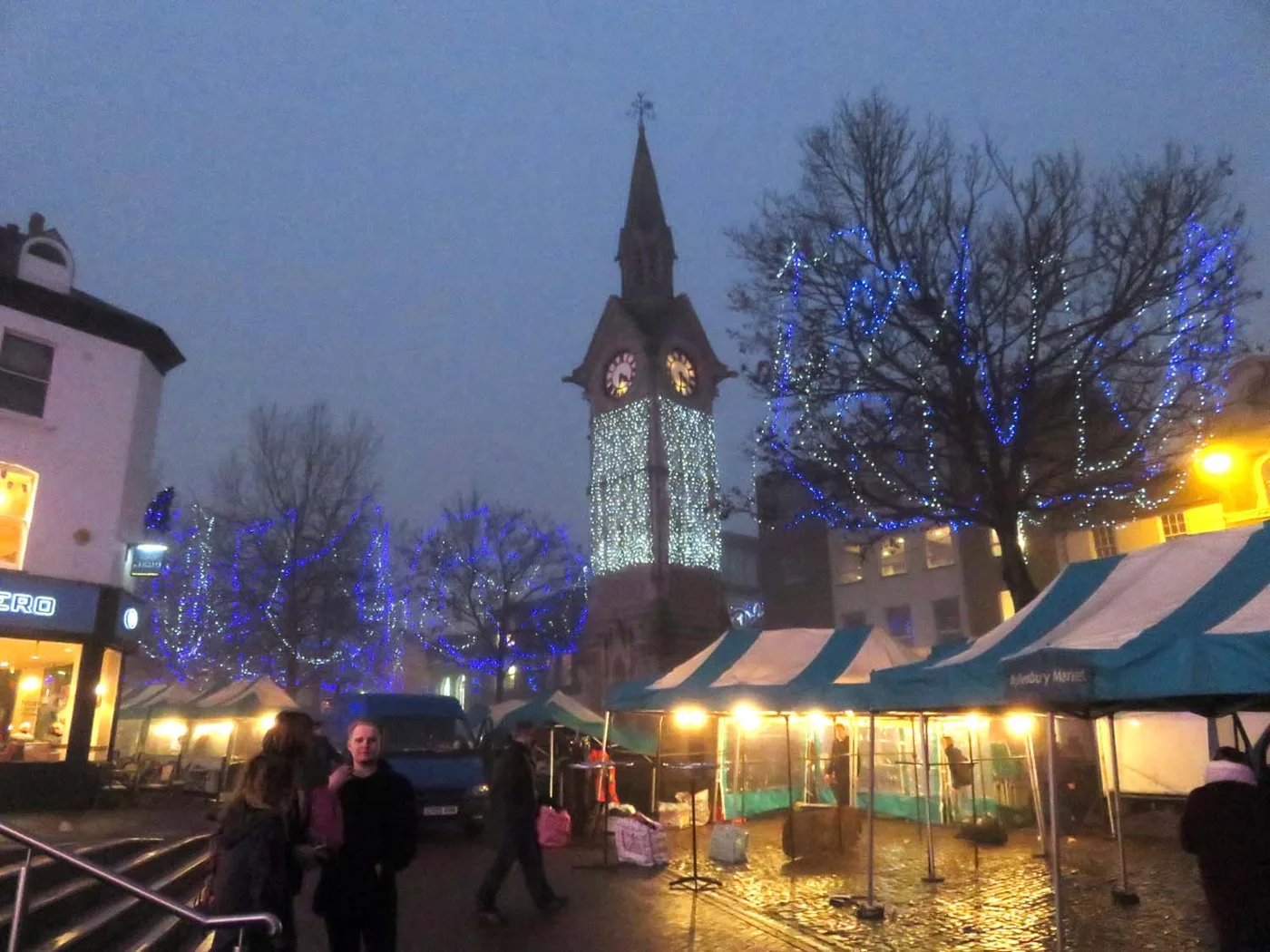 The Clock Tower in Aylesbury Market Square under the Christmas lights. The stage, the accessible viewing area and the countdown all sit in this square, which closes to traffic for the day