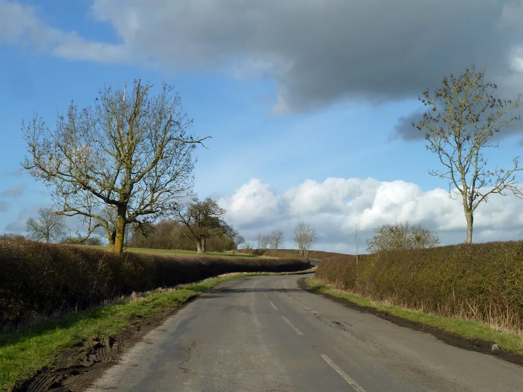 The road between Marsh Gibbon and Poundon. The scheme's cable route would follow the lane linking the two villages.